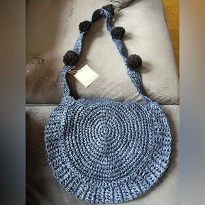 Shiraleah Chicago round straw bag with pompoms